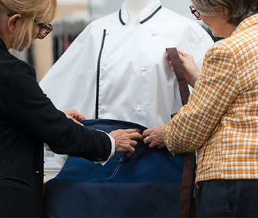 What Does Deane’s Custom Uniform Design Service Include?